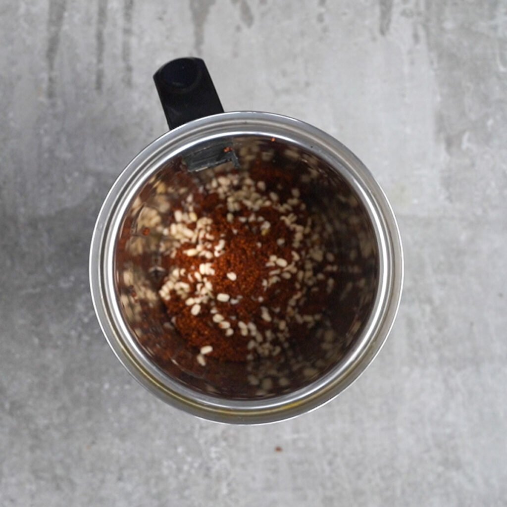 Ragi and urad dal in a blender