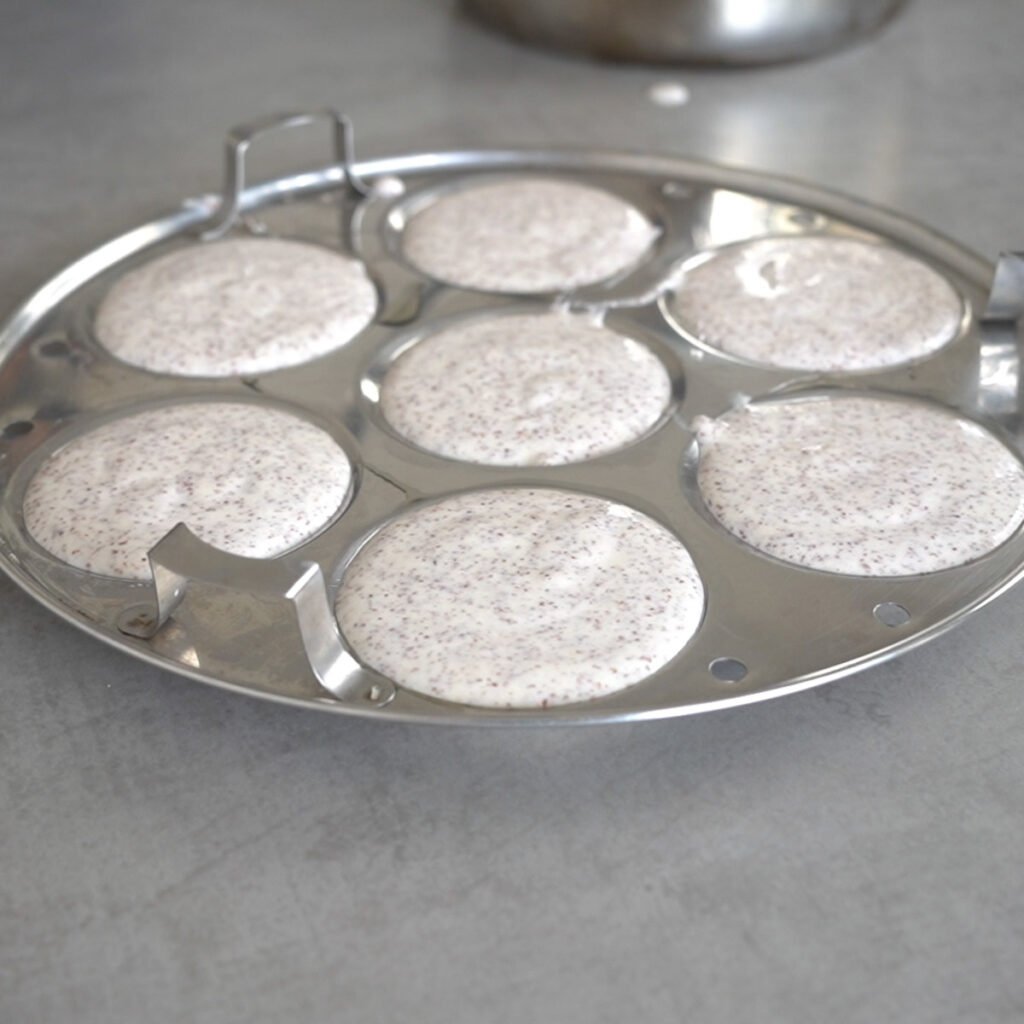 Making Ragi idli