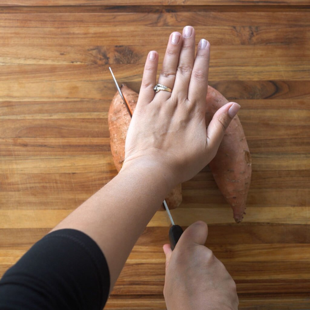 cutting sweet potato wedges