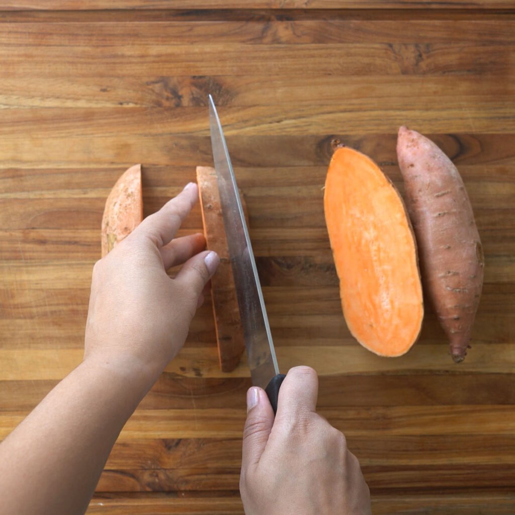 cutting sweet potato wedges