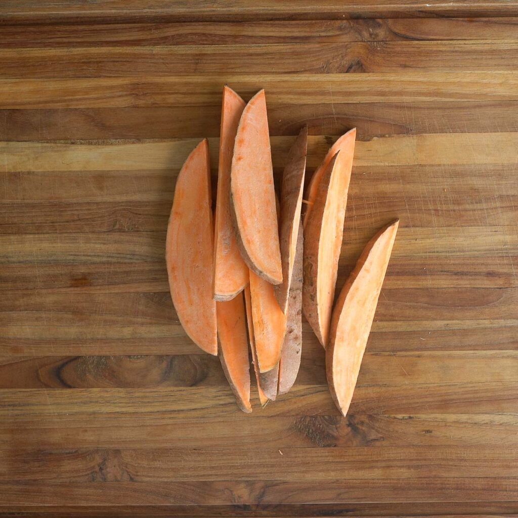 cutting sweet potato wedges