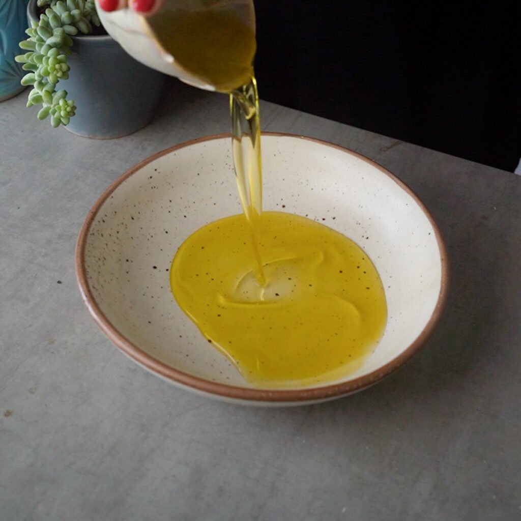 Making bread dipping olive oil