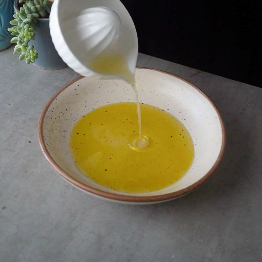 Making bread dipping olive oil
