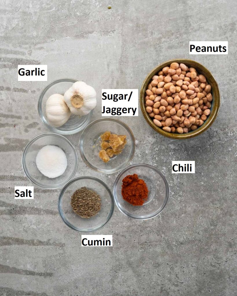 Ingredients needed to make peanut chutney
Peanuts
Jaggery or sugar
Garlic
Chili powder
Cumin
Salt