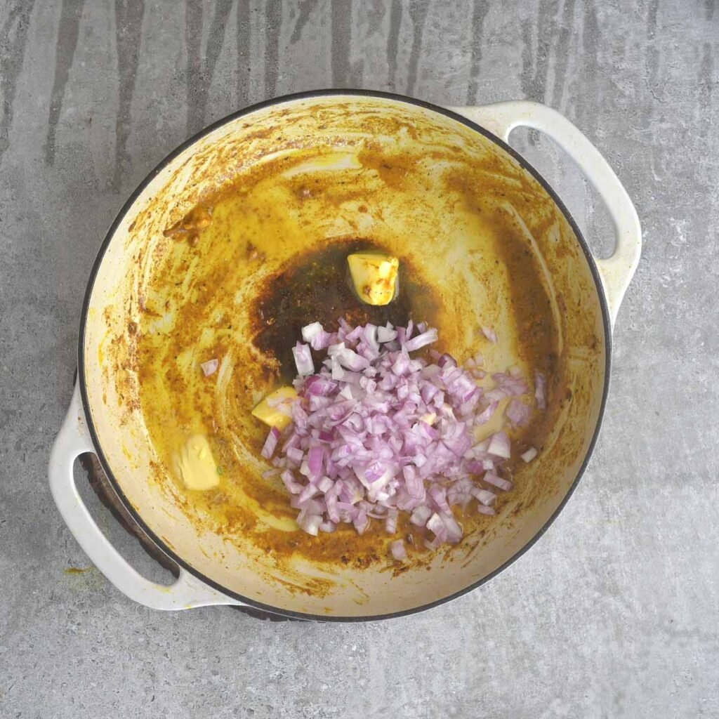 Making the gravy with the pan drippings, butter and onion