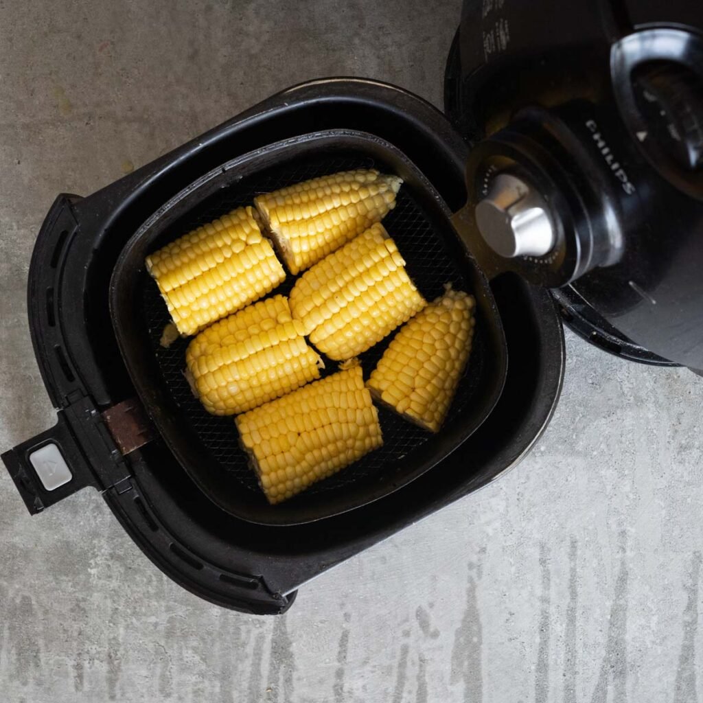 fit the cut corn inside the air fryer basket