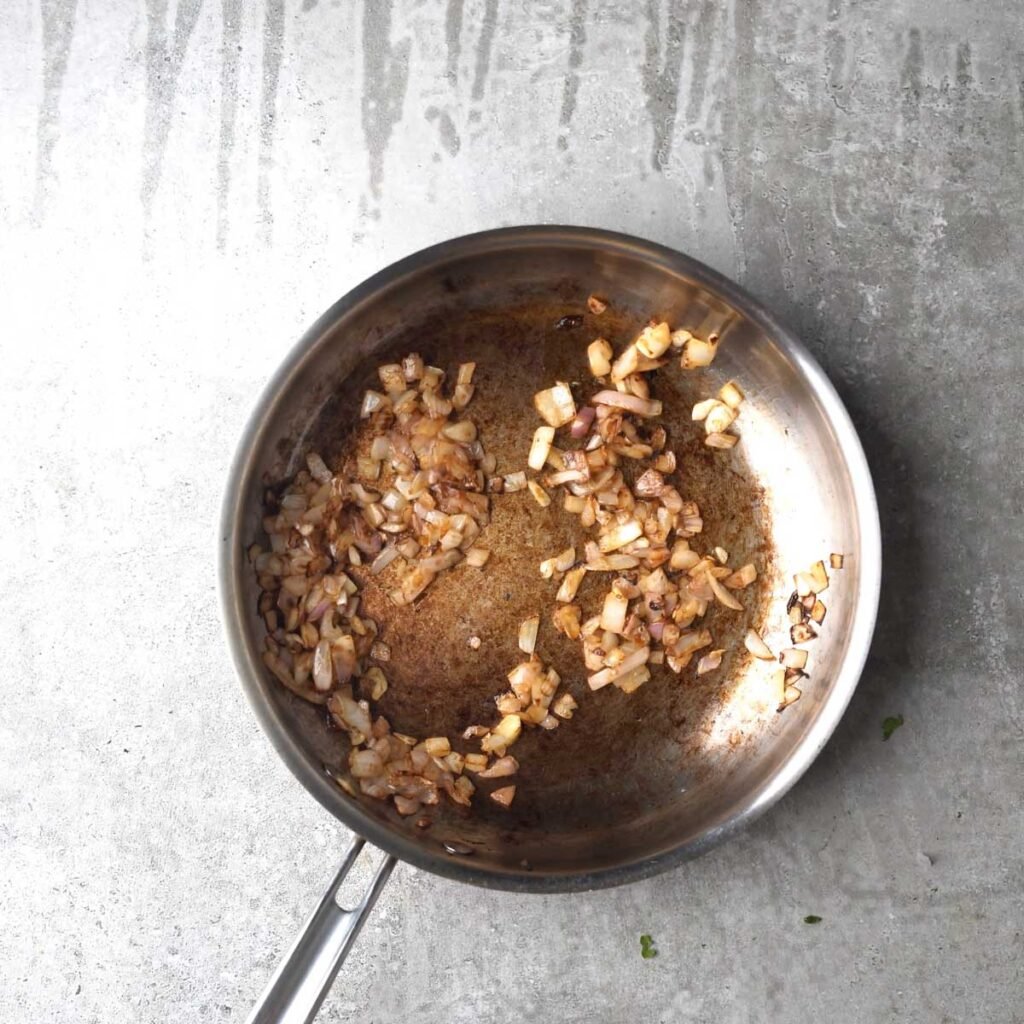 caramelized brown onion in a pan