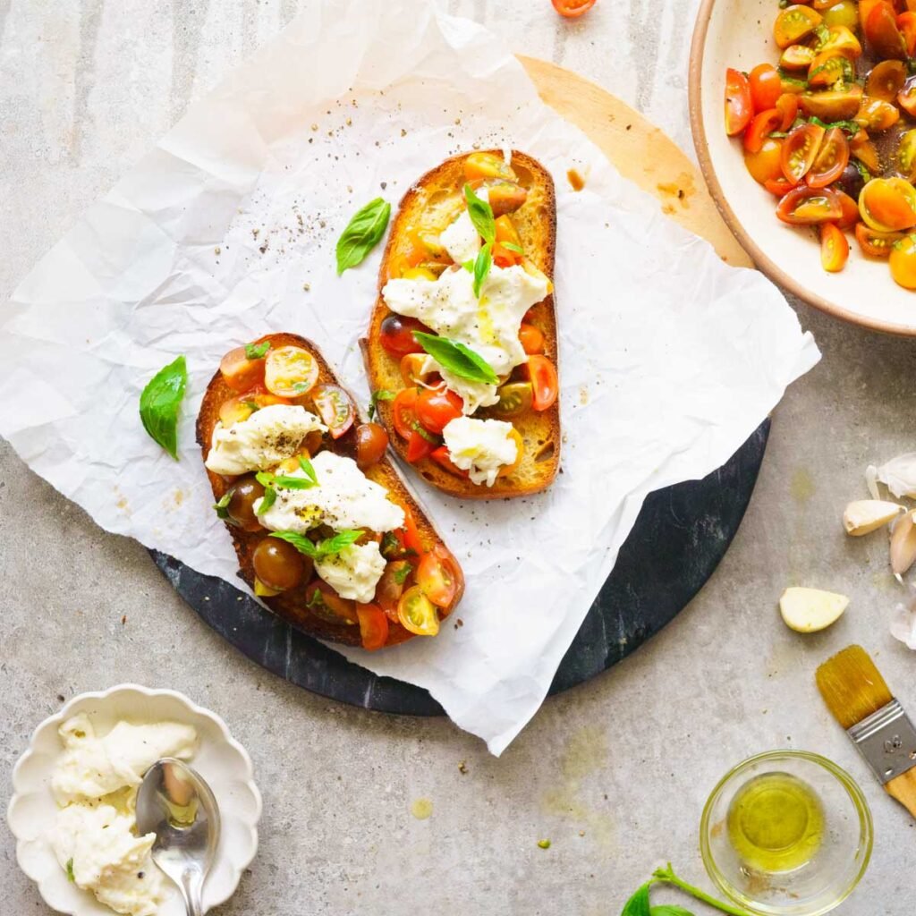 Sour dough bread topped with tomatoes and cheese 