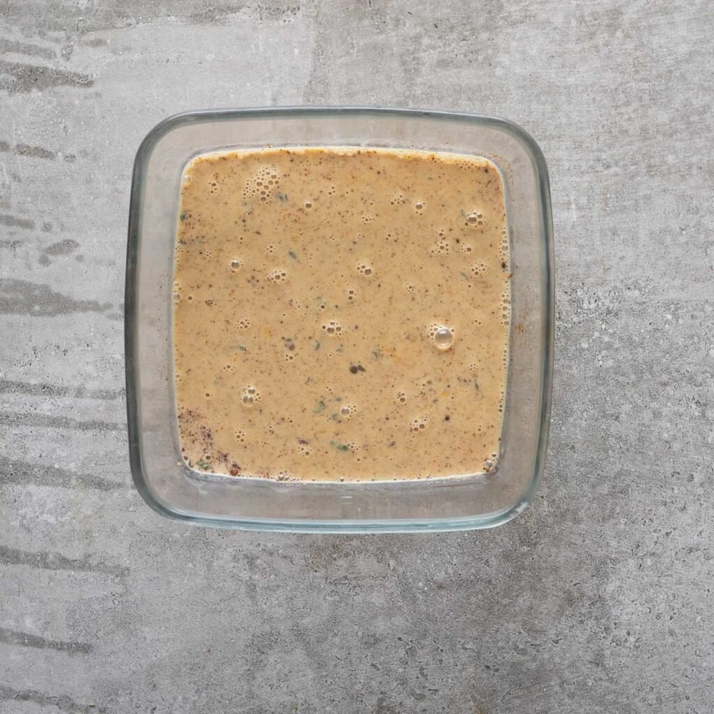 Whisked Milk, Egg, garlic powder, paprika and herbs in a shallow square dish.