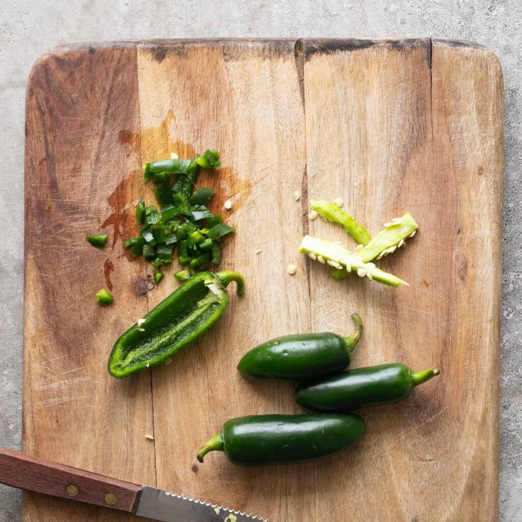 Chopped jalapenos with the seeds and pith removed