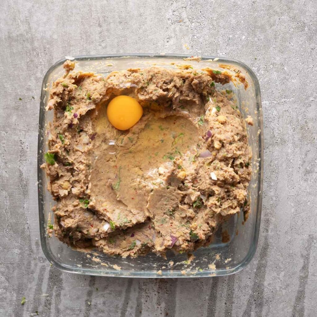 Shami kebab mixture with an egg