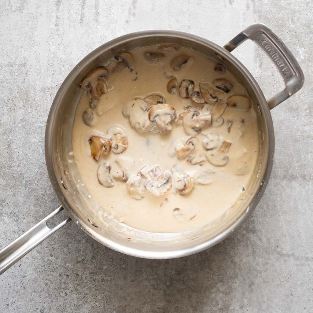 mushroom sauce inside a stainless steel pan