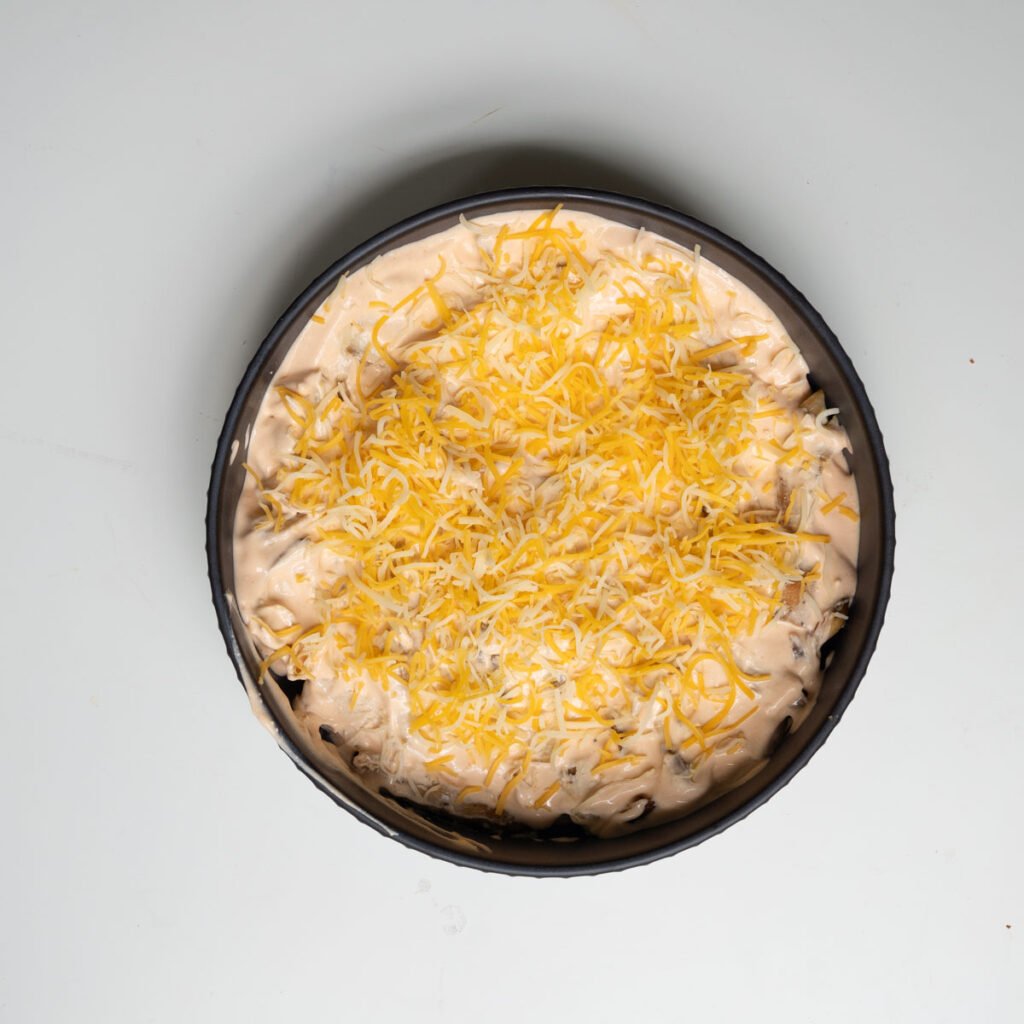 shredded chicken topped with blended cottage cheese and hot sauce