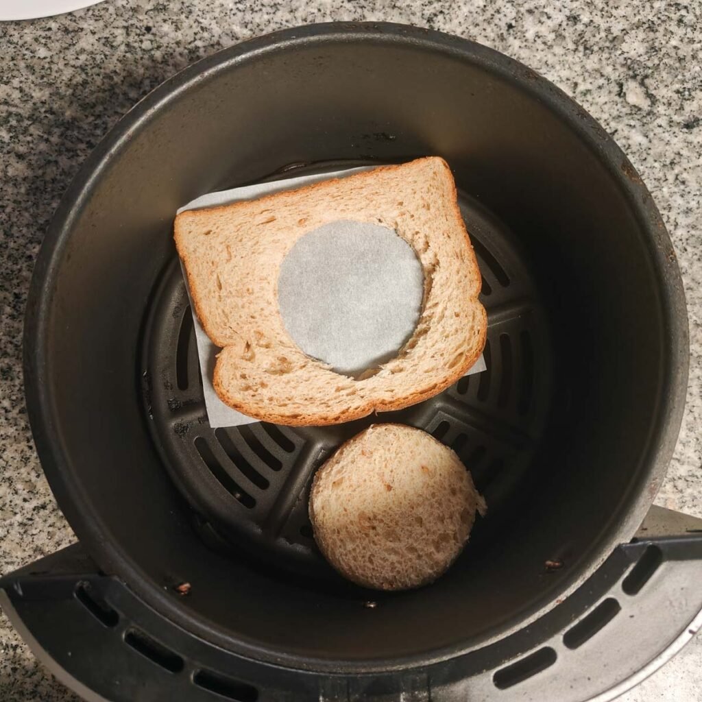 Bread where center has been cut out on an air fryer